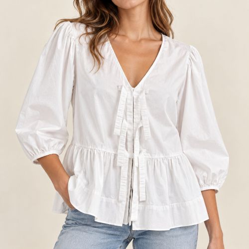 blouse met strikjes