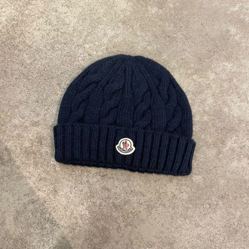 muts cable-knit met logo